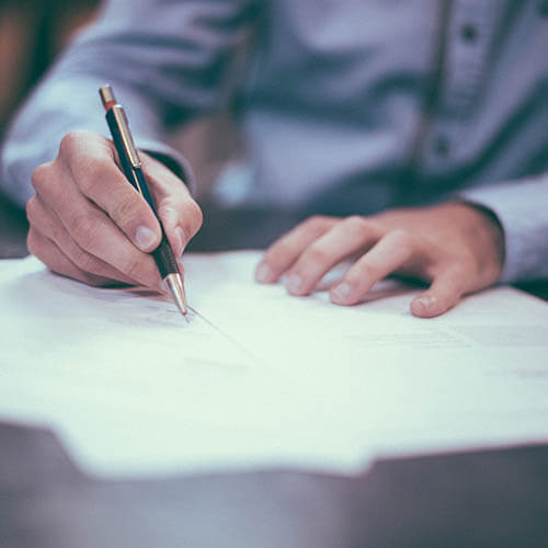 man reviewing paperwork